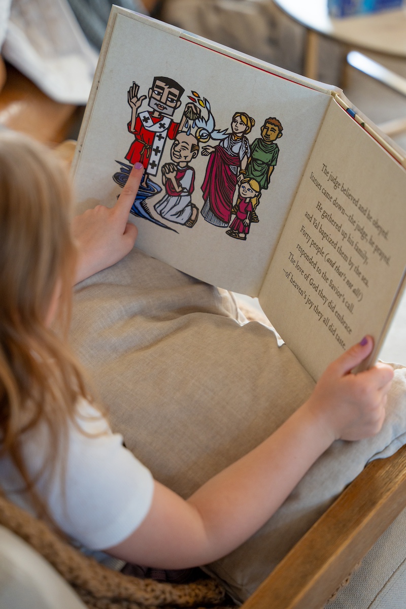 Child Reading Open Saint Valentine the Kindhearted by Ned Bustard