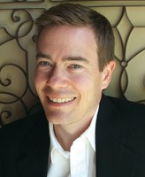 Adam C. English